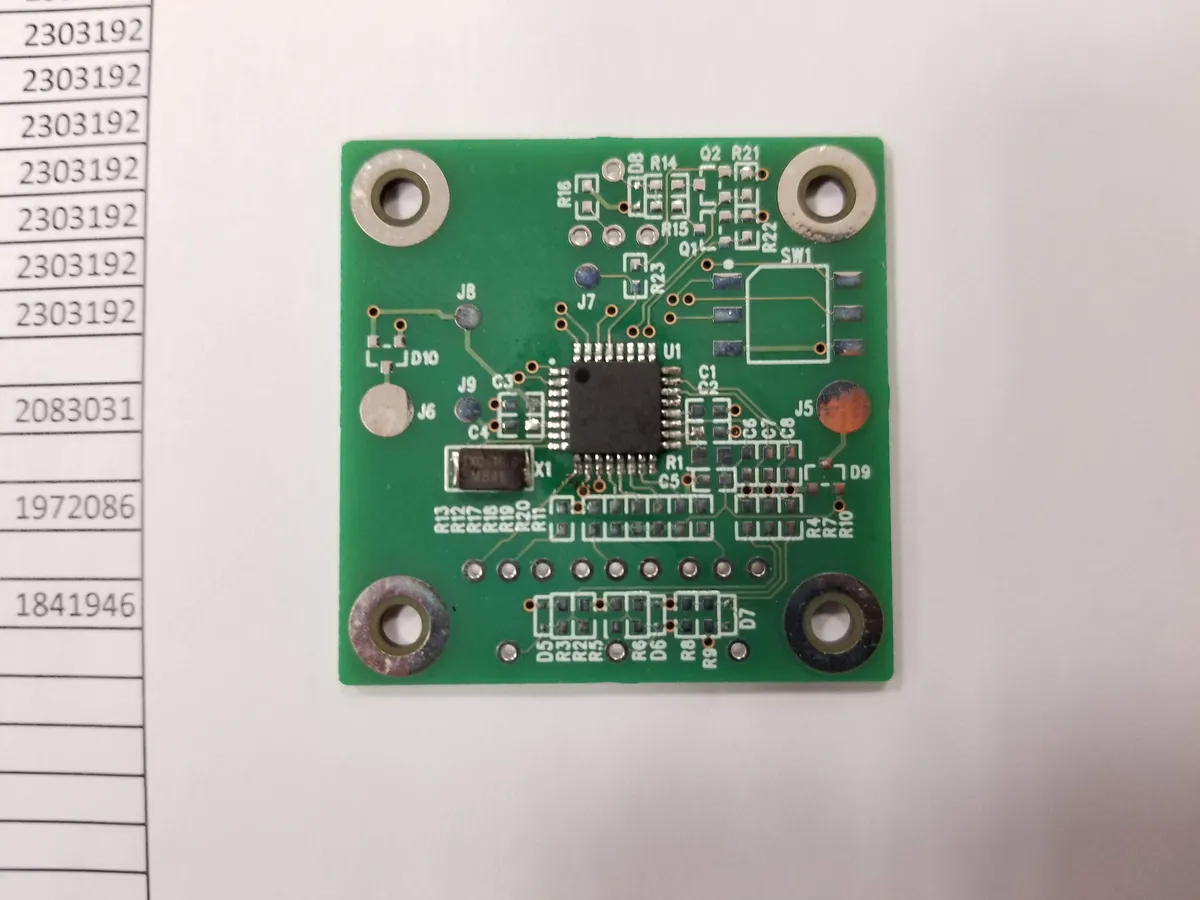 Bare logic gate module PCB with ATmega microcontroller and SMD components