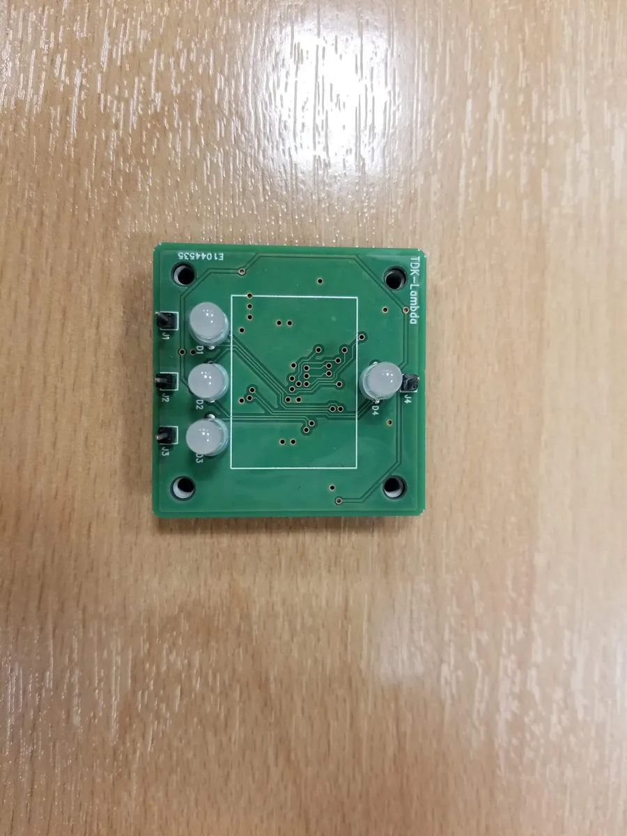 Logic gate module PCB front showing LED outputs, reed switch inputs, and TDK-Lambda branding