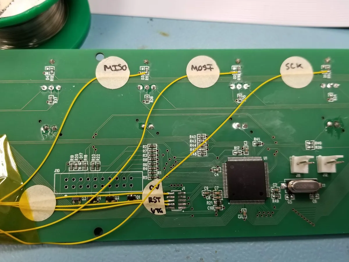 Controller board PCB with ATmega microcontroller and bodge wires during bring-up