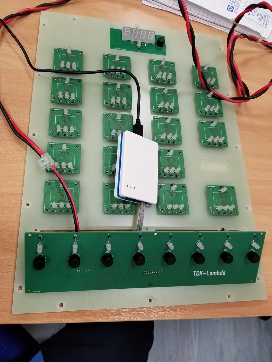 Complete board with logic gate modules, push buttons, 7-segment clock display, and SPI programmer